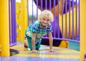 a child on playground equipment
