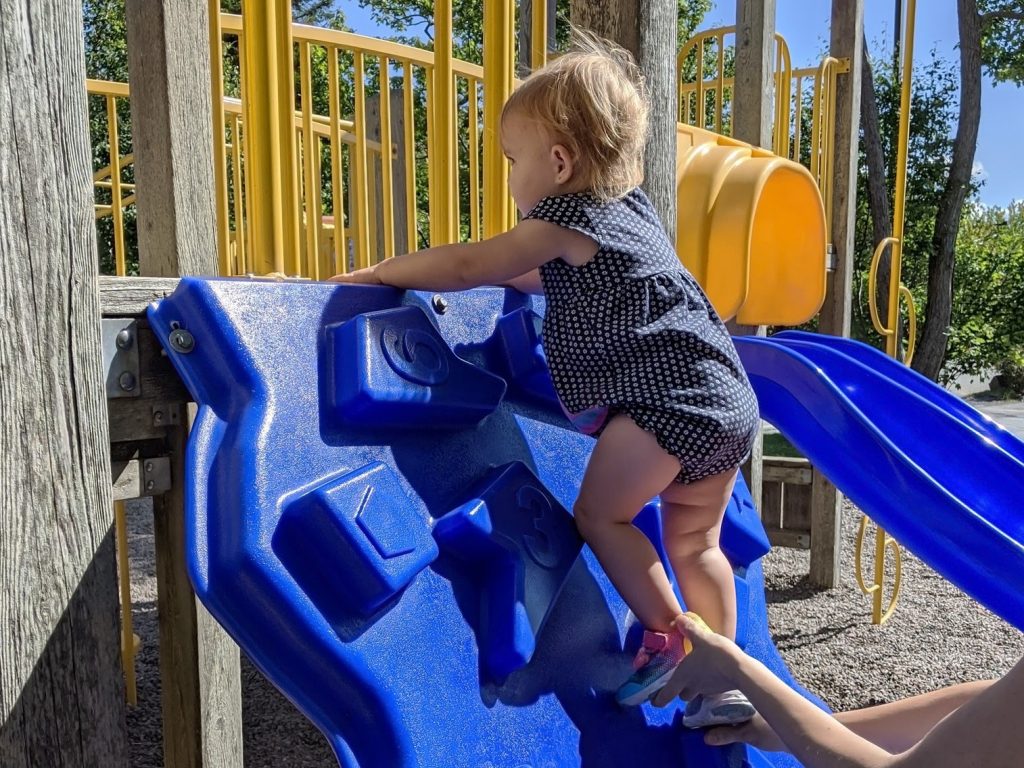 a child climbing a play place