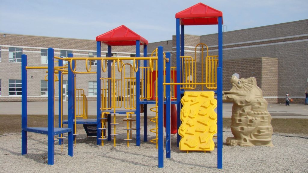 Custom outdoor playground outside of a school