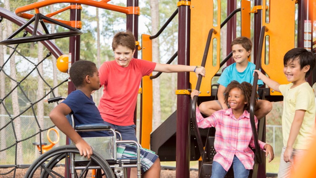 Kids on an accessible custom playground