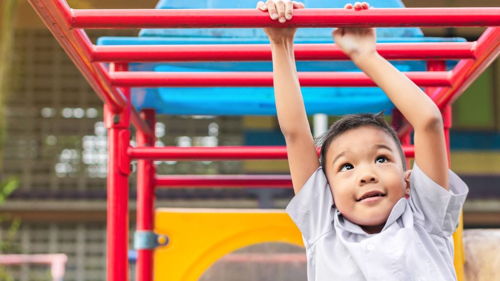 Child playing on outdoor playground