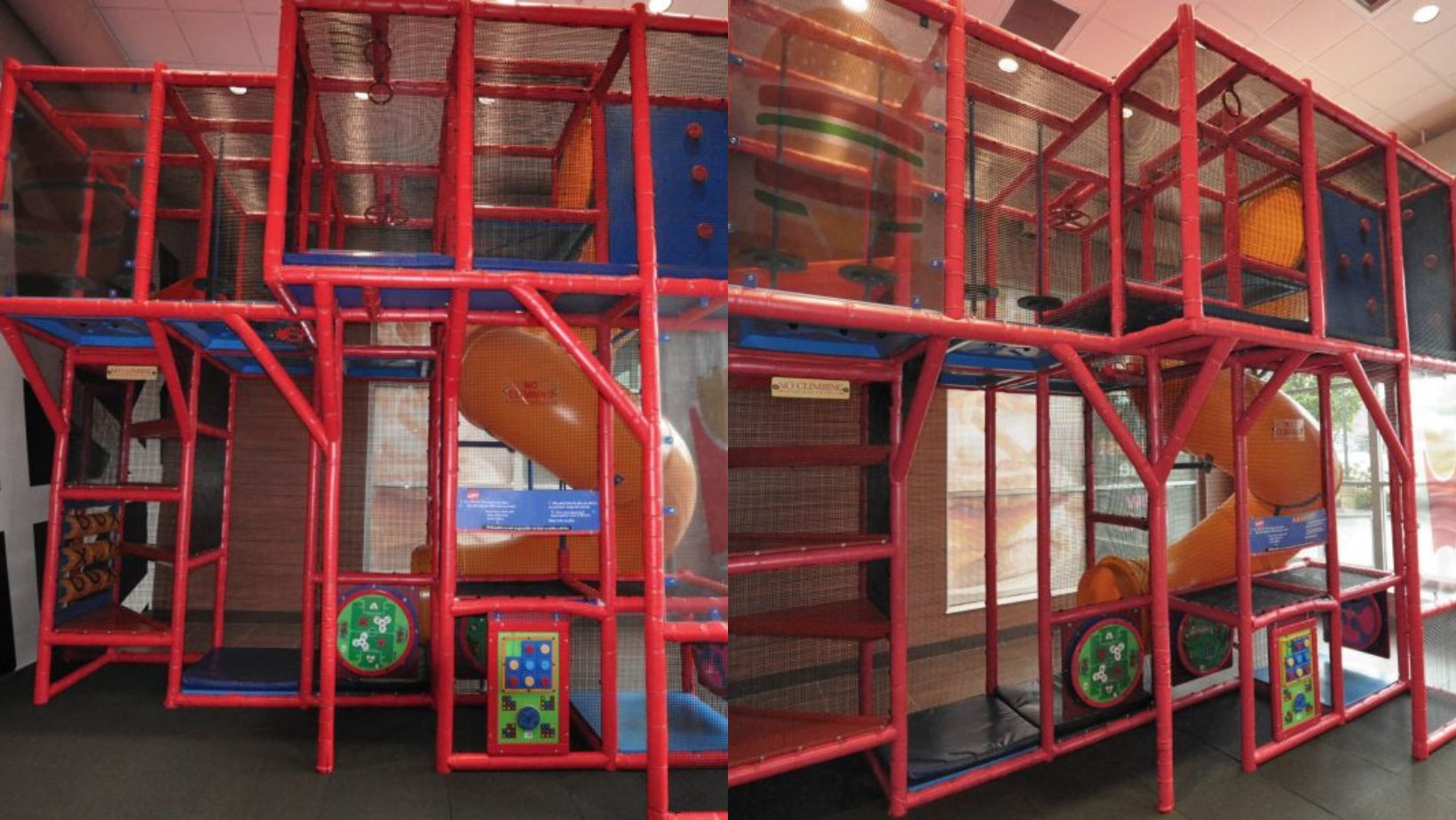 Indoor playground with a red climbing structure, blue panels, and an orange slide. The bright setup suggests a fun and active play area for kids.